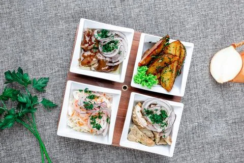 Assorted traditional cold appetizers platter (snack board) with pickled butte Stock Photos