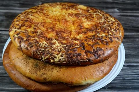 Assorted Turkish soft bread of plain and with other toppings of Thyme and R.. Stock Photos