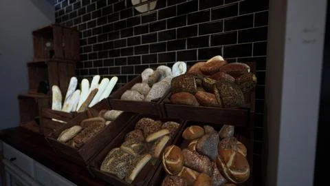 Assorted Types of Bread Displayed in a Case 스톡 일러스트