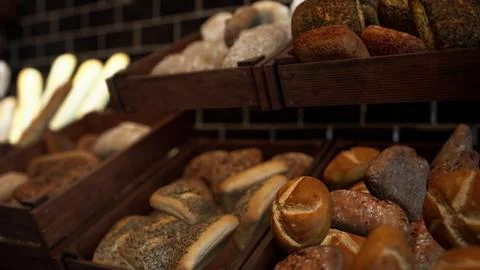 Assorted Types of Bread Displayed on Store Shelves Stock Illustration