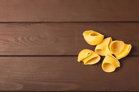 Assorted uncooked pasta in bowls Stock Photos