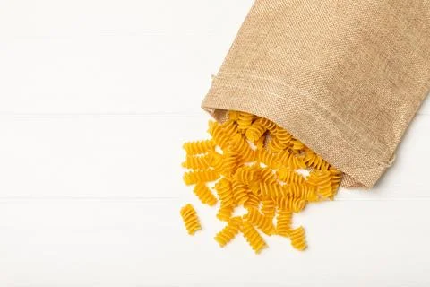 Assorted uncooked pasta in bowls Stock Photos