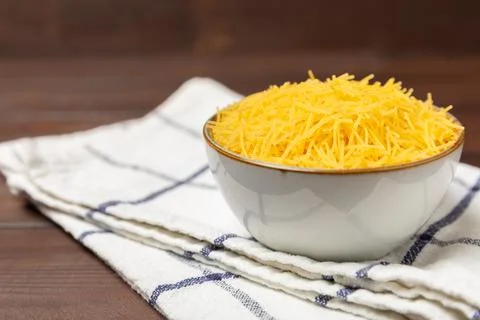 Assorted uncooked pasta in bowls. Stock Photos