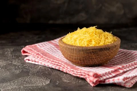 Assorted uncooked pasta in bowls. Stock Photos