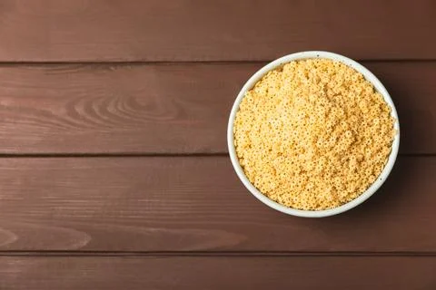 Assorted uncooked pasta in bowls. Stock Photos
