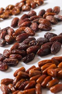 Assorted Varieties of Dates on White Background Stock Photos
