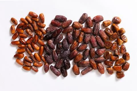 Assorted Varieties of Dates on White Background Stock Photos