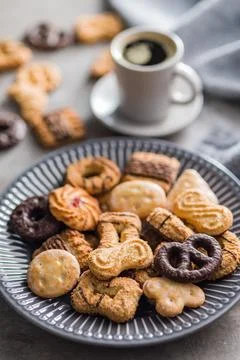 Assorted various cookies. Sweet biscuits on plate. Stock Photos
