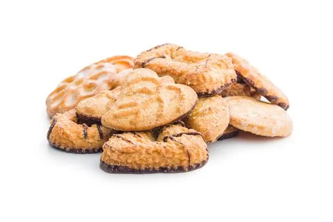 Assorted various cookies. Sweet biscuits isolated on white background. Stock Photos