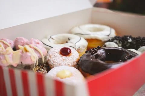 Assorted various of donuts with cream and powder glazed Fotos Stock