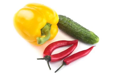 Assorted vegetables, fresh bell pepper, chilli pepper, cucumber and lettuce Stock Photos