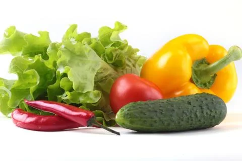 Assorted vegetables, fresh bell pepper, tomato, chilli pepper, cucumber and Foto stock