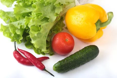 Assorted vegetables, fresh bell pepper, tomato, chilli pepper, cucumber and Stock Photos