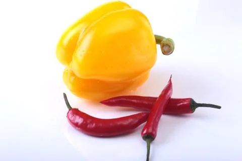 Assorted vegetables, fresh bell pepper, chilli pepper and cucumber isolated on Stock Photos