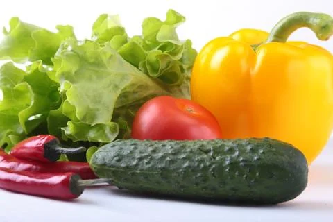 Assorted vegetables, fresh bell pepper, tomato, chilli pepper, cucumber and Stock Photos