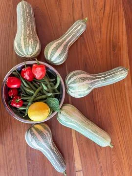 Assorted vegetables on a wooden table Stock Photos