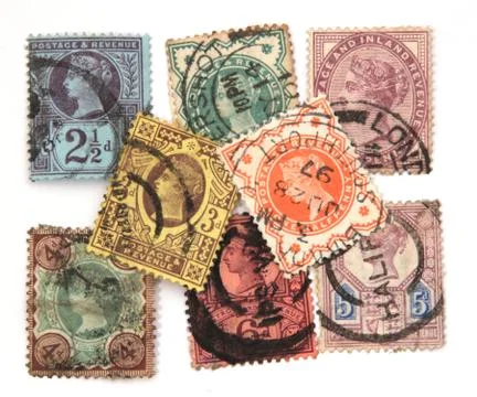 Assorted victorian postage stamps. Stock Photos