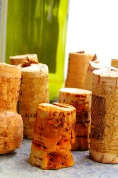 Assorted wine corks closeup and wine bottle Stock Photos