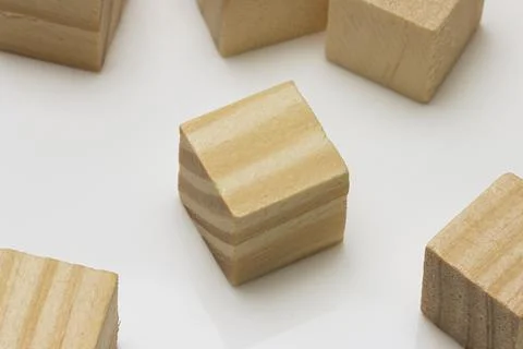 Assorted Wooden Blocks Cubes Squares on white background Stock Photos
