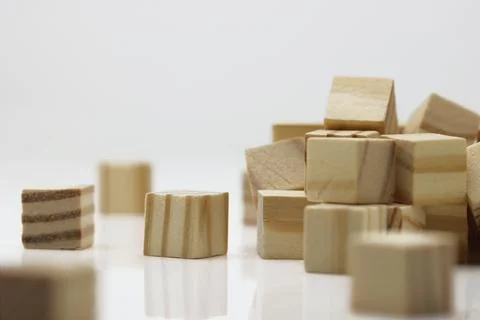 Assorted Wooden Blocks Cubes Squares on white background Stock Photos