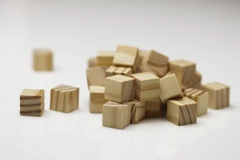 Assorted Wooden Blocks Cubes Squares on white background Stock Photos