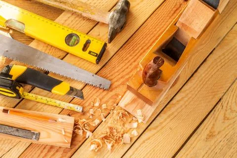Assorted work tools on wood. Copy space Stock Photos