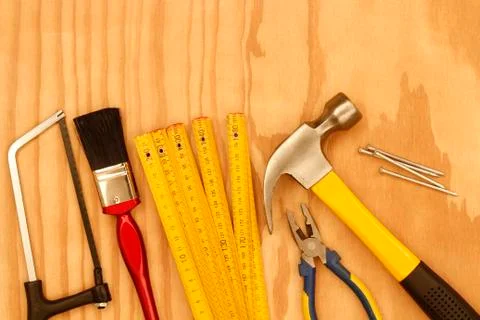 Assorted work tools on wood Stock Photos