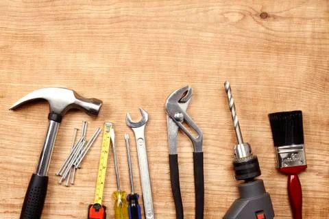 Assorted work tools on wood Stock Photos