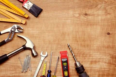 Assorted work tools on wood Stock Photos