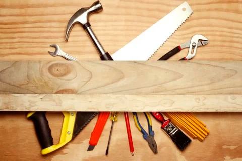 Assorted work tools on wood Stock Photos