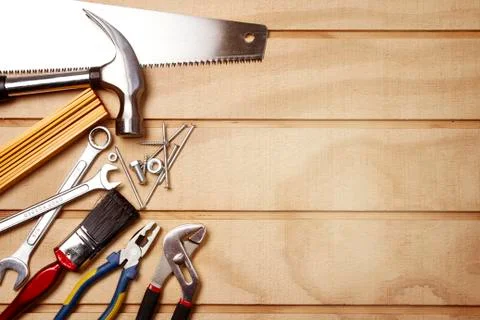 Assorted work tools on wood Stock Photos