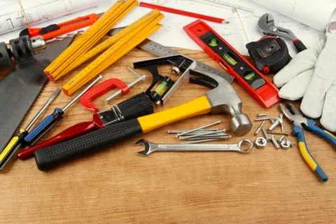 Assorted work tools on wood Stock Photos