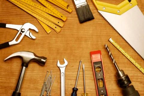 Assorted work tools on wood Stock Photos