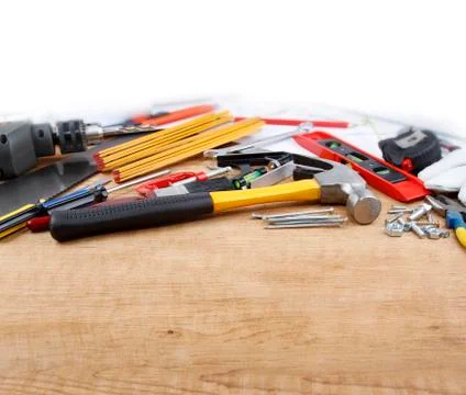 Assorted work tools on wood Stock Photos