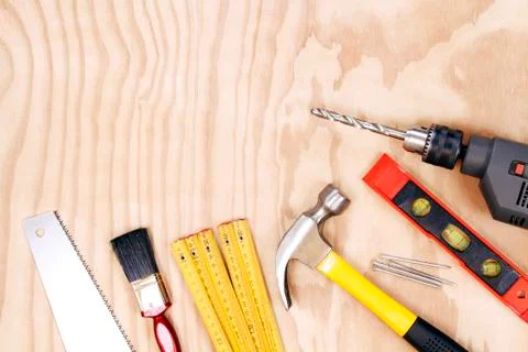 Assorted work tools on wood Stock Photos
