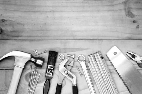 Assorted work tools on wood Stock Photos