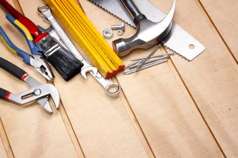 Assorted work tools on wood Stock Photos