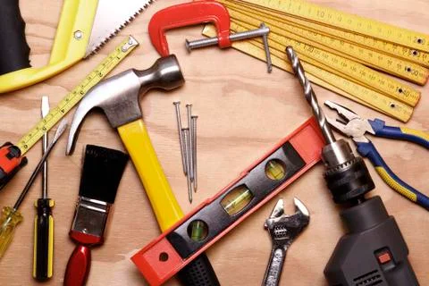 Assorted work tools on wood Stock Photos