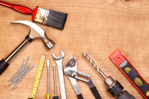 Assorted work tools on wood Stock Photos