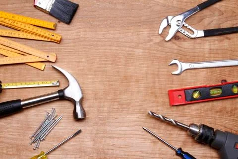 Assorted work tools on wood Stock Photos