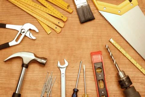 Assorted work tools on wood Stock Photos