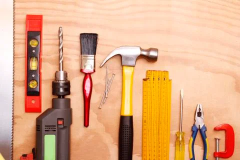Assorted work tools on wood Stock Photos