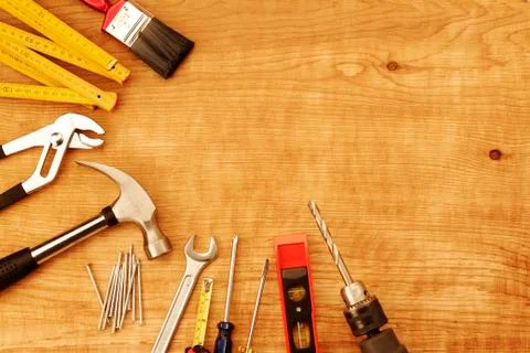 Assorted work tools on wood Stock Photos