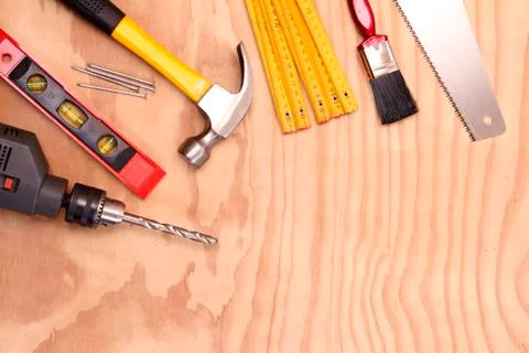 Assorted work tools on wood Stock Photos