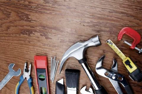 Assorted work tools on wood Stock Photos