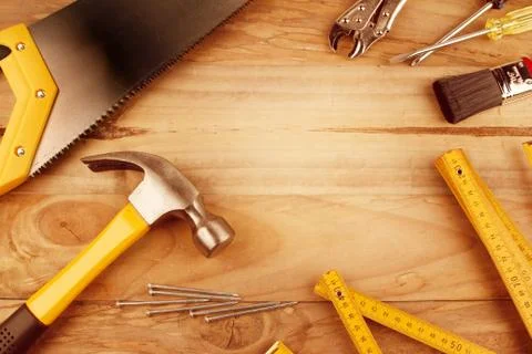 Assorted work tools on wood Stock Photos