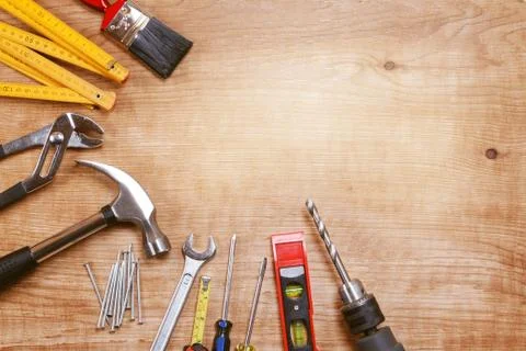 Assorted work tools on wood Stock Photos
