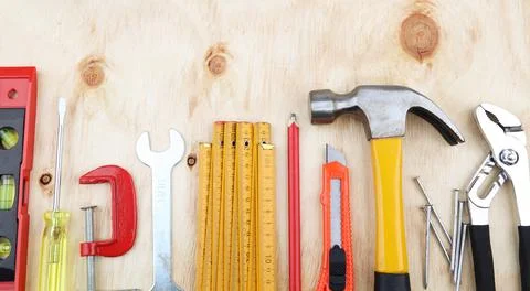 Assorted work tools on wood Stock Photos