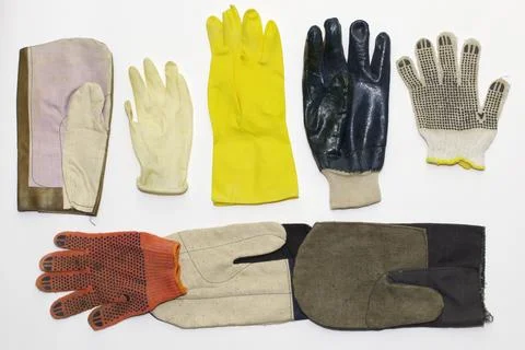 Assorted working protective gloves: textile (for gardening, with rubber dot.. Stock Photos