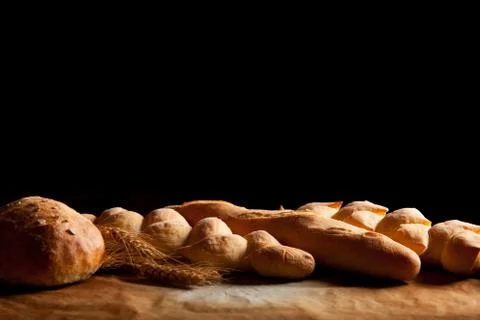 Assortment of baked bread on table Stock Photos